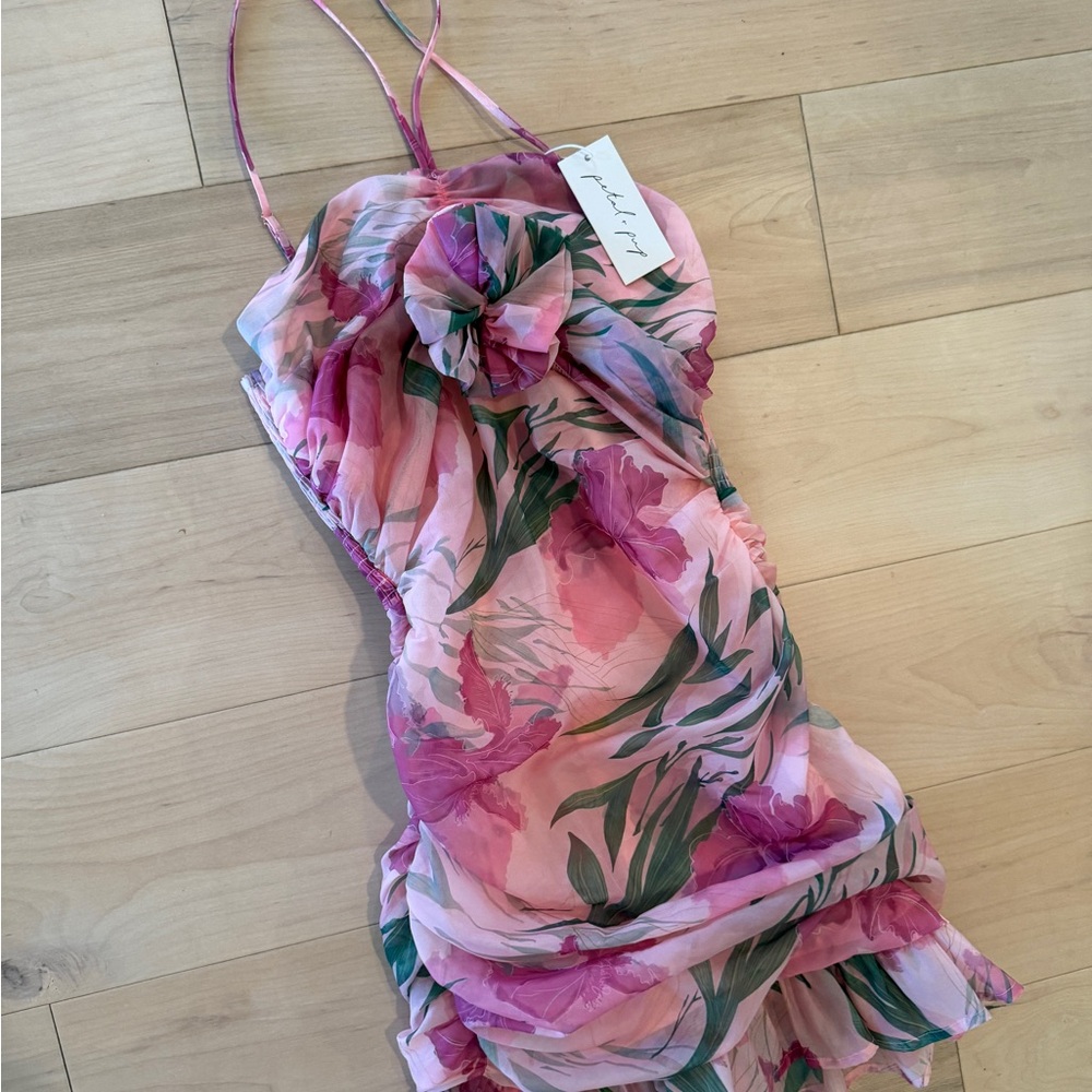 New with tags Floral Pink Dress with Ruffle Details size small. Petal & Pup.